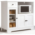 Armoire basse de cuisine avec niche pour micro ondes, trois portes et tablette reglable